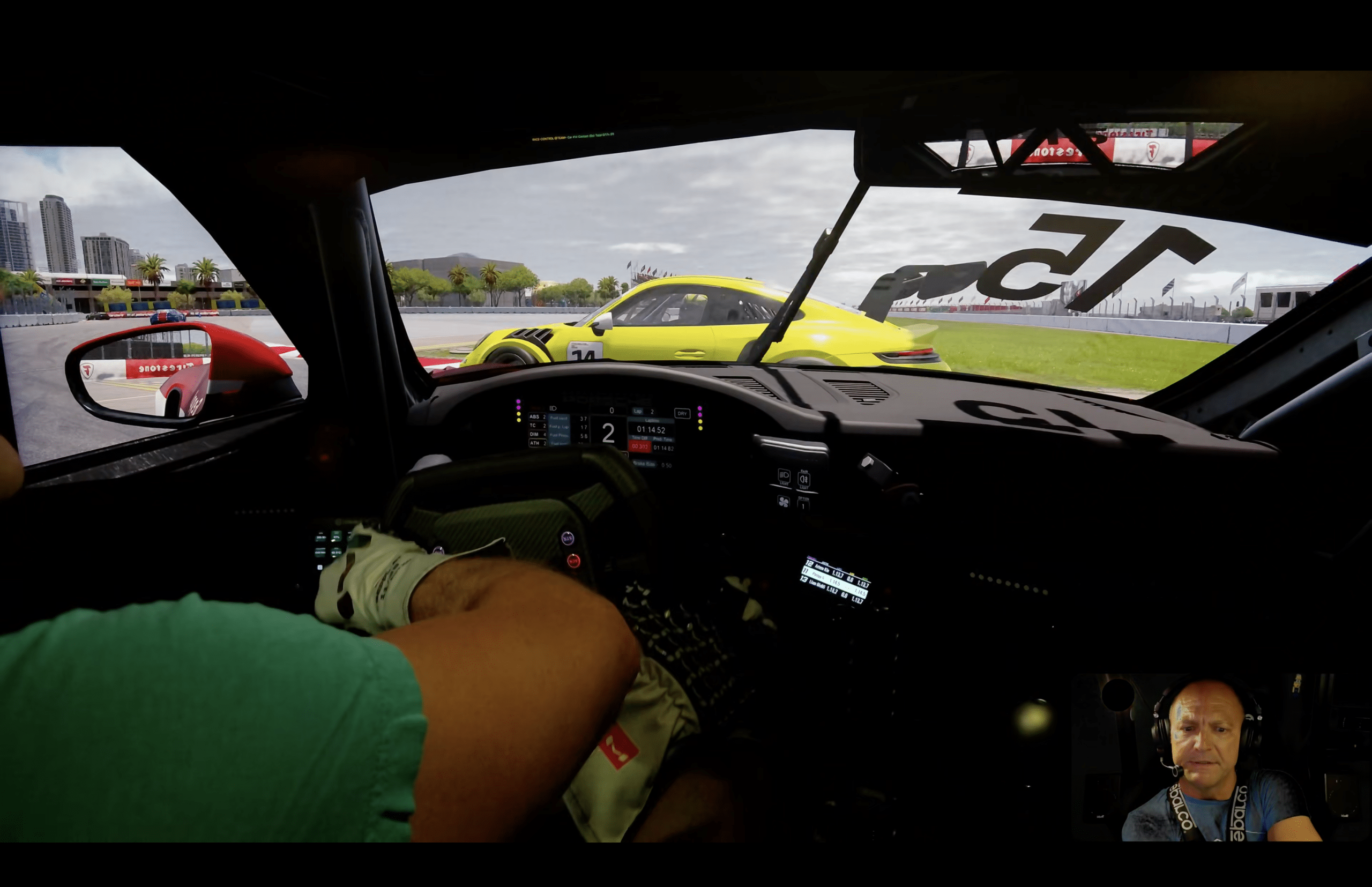 iRacing Porsche Cup cockpit view at St. Petersburg Grand Prix, chasing a yellow Porsche 911 Cup through a fast street section