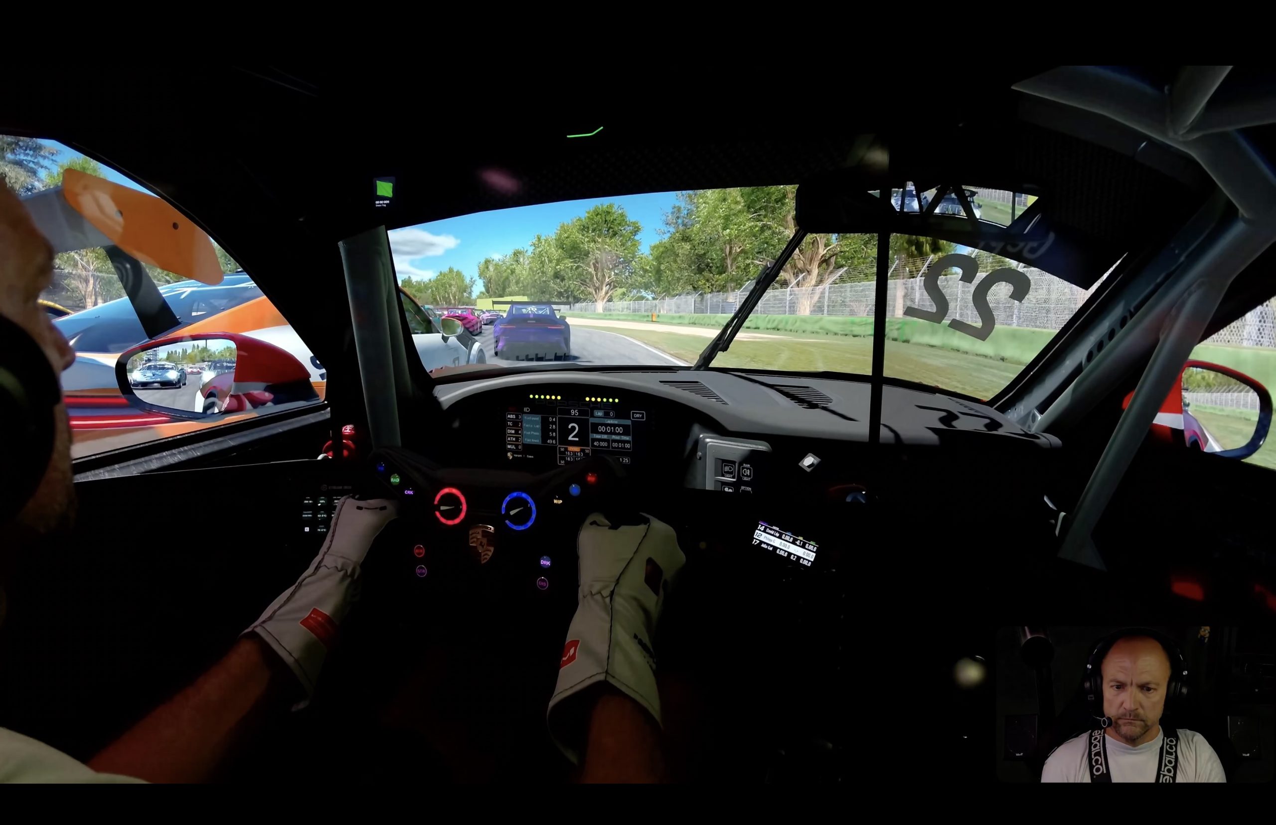 Onboard triple-screen cockpit view at Imola in the iRacing Porsche Cup, Porsche 911 Cup 992.2 in midfield traffic