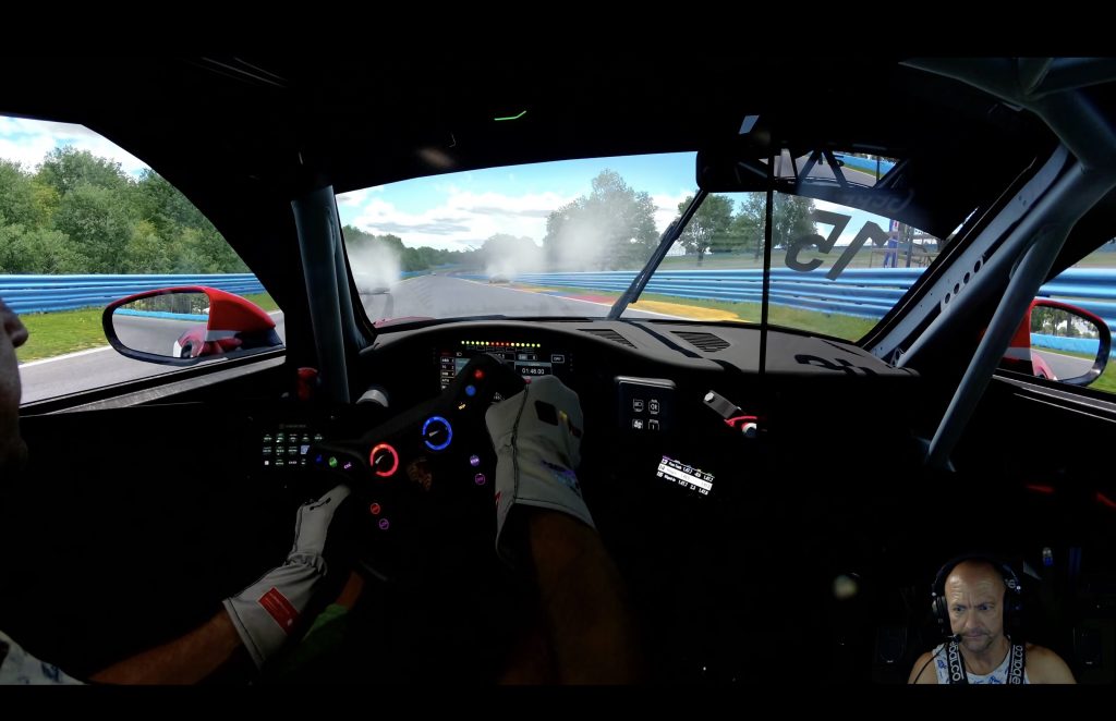 Onboard cockpit view of the Porsche Cup car in Austria livery at Watkins Glen International.