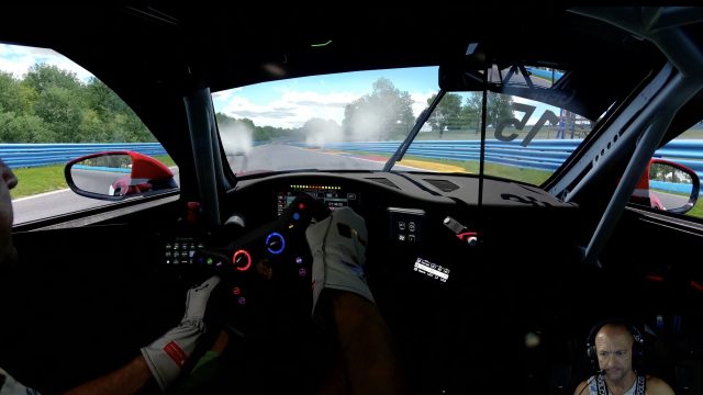 Onboard cockpit view of the Porsche Cup car in Austria livery at Watkins Glen International.