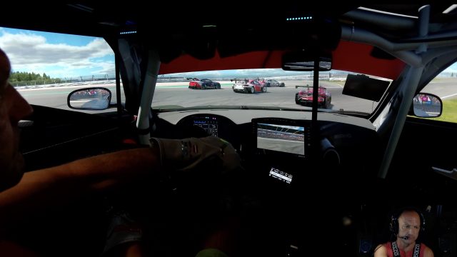 Mercedes-AMG GT3 cockpit view chasing a pack of GT3 cars through a corner during the DTM Nürburgring iRacing race