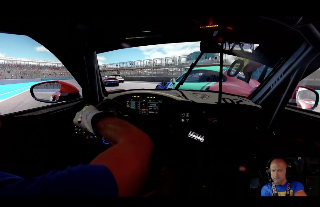 Porsche Cup Miami race start onboard, side by side with a pink and teal 911 Cup on the main straight